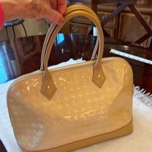 Arcadia patent leather dome satchel.